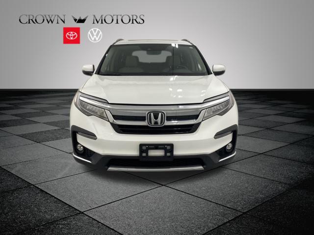 Used 2022 Honda Pilot Touring with VIN 5FNYF6H90NB004050 for sale in Holland, MI