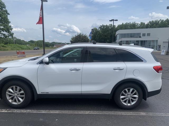 Used 2016 Kia Sorento LX with VIN 5XYPGDA56GG002867 for sale in North Canton, OH